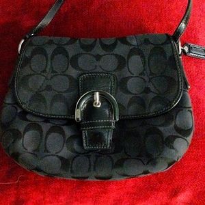Woman's small gray/black shoulder bag